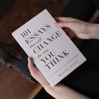 someone is holding a book